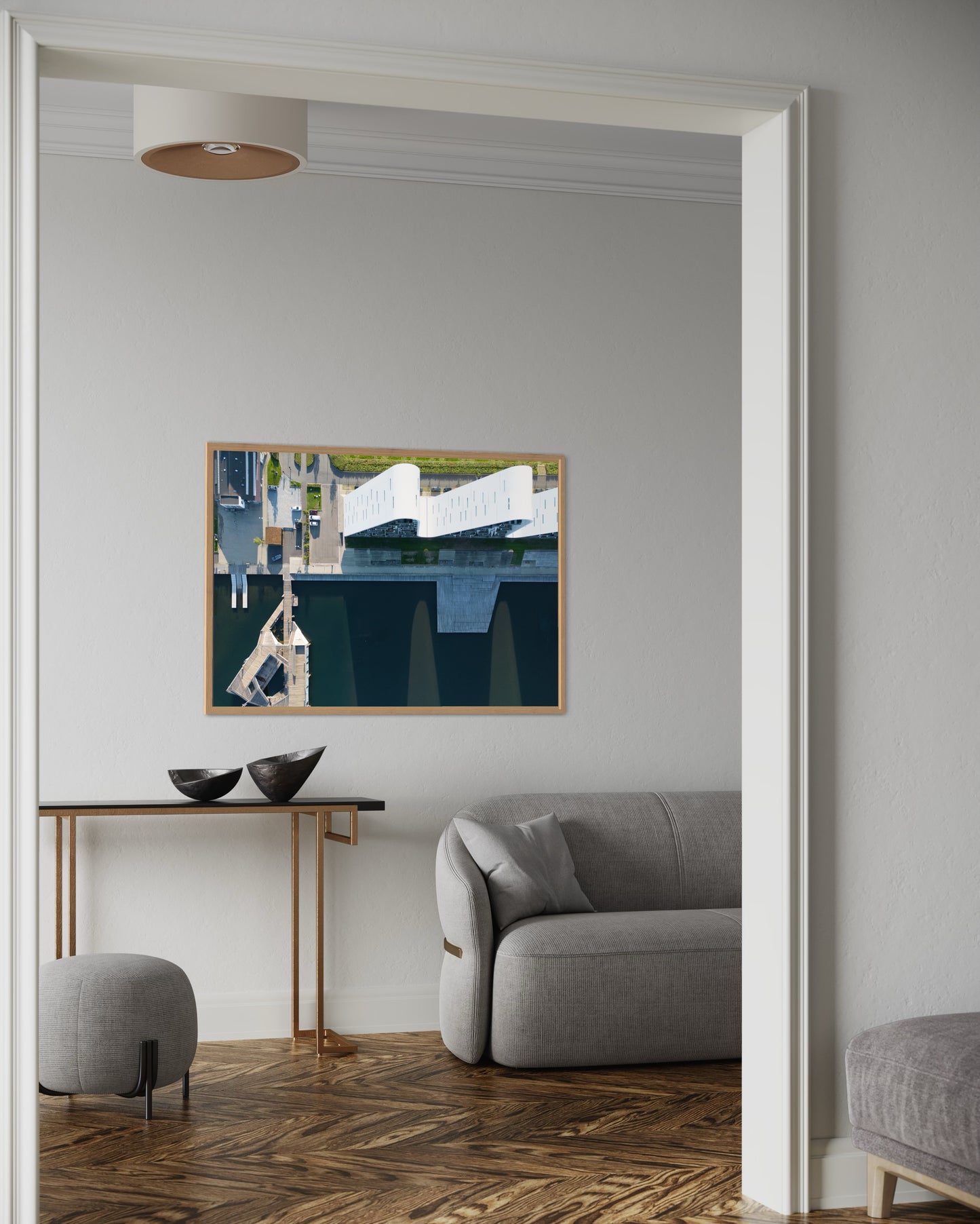 Landskabsbillede af Bølgen i Vejle der kaster sine skygger ud i fjorden. Dronebillede af landskab, natur og arkitektur trykt som plakat eller på fotolærred til hjemmet